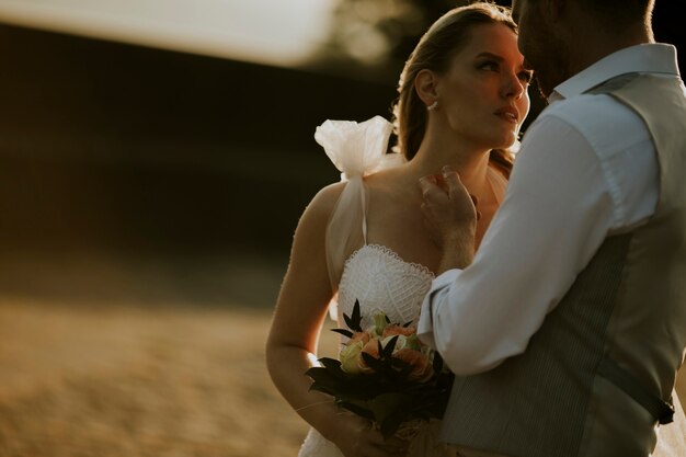 Closeup of the cute young newlywed couple