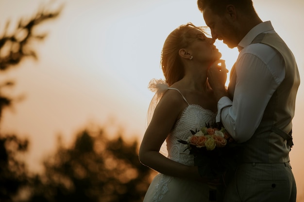 Closeup of the cute young newlywed couple