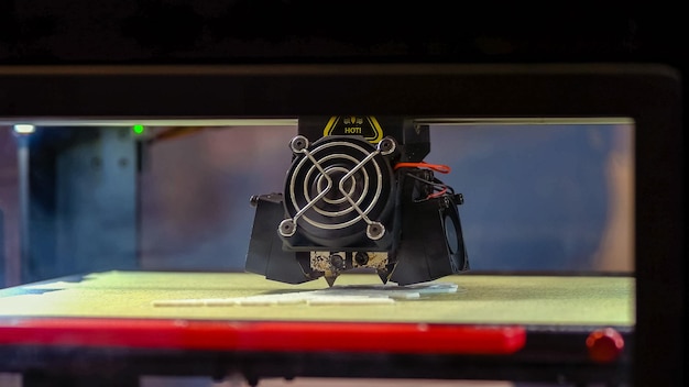 Closeup d printer laser creating a white model modrn hitech technology