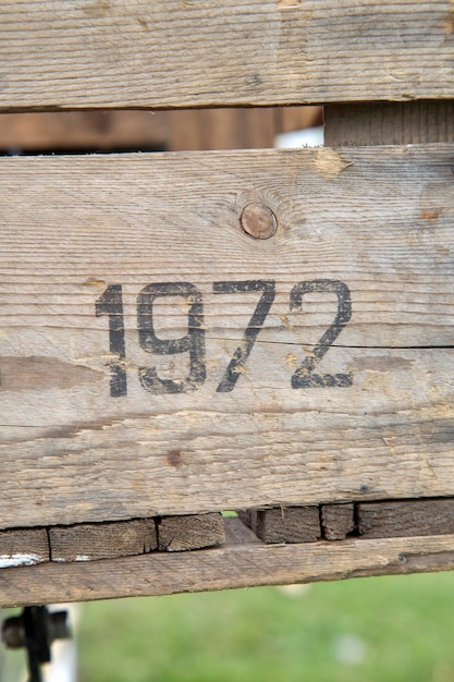 Closeup of Date 1972 Printed on Wood