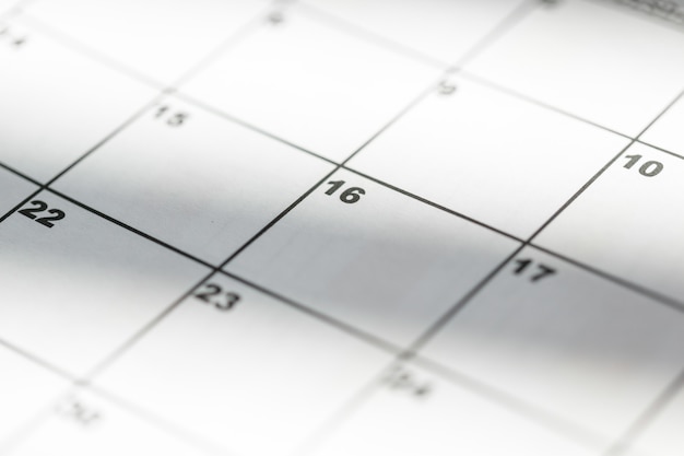 Photo closeup of dates on calendar page