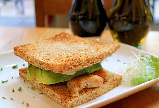 Closeup of Delectable Grilled Chicken Breast and Avocado Sandwich