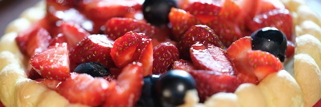 Closeup of delicious biscuit fresh strawberry cake