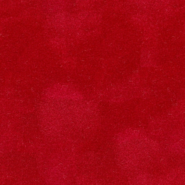 Closeup detail of aged red velvet background Seamless square texture tile ready