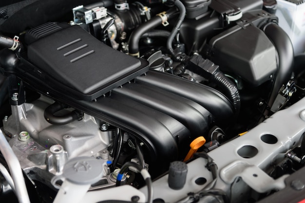 Closeup detail of new car engine with soft-focus and over light in the background