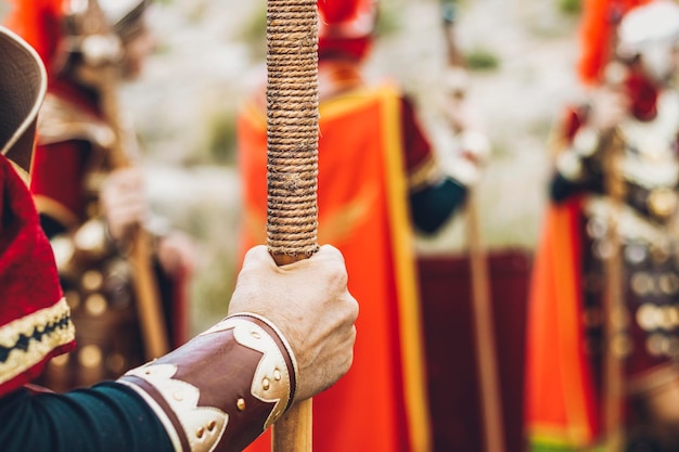 Closeup detail of a Roman warrior39s hand holding a spear