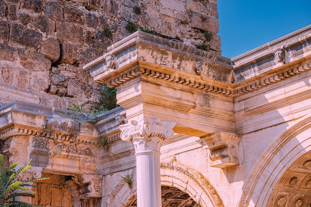 Closeup details of a famous gate or Hadrian's Arch in Antalya Travel landmarks and restoration of heritage site in Turkey