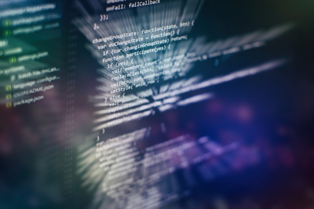 closeup developing programming and coding technologies. developer working on web sites codes in office.