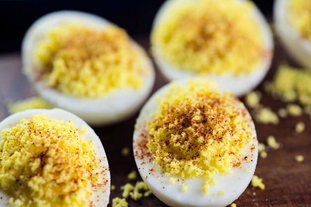 Premium Photo  Closeup of deviled boiled eggs with paprika in 4k image