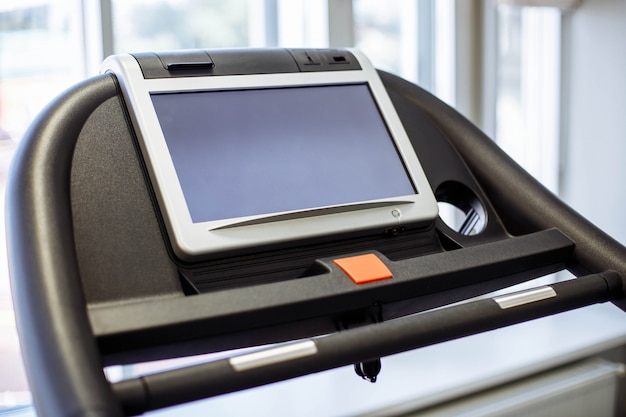 Closeup of the display of the treadmill in the fitness room.