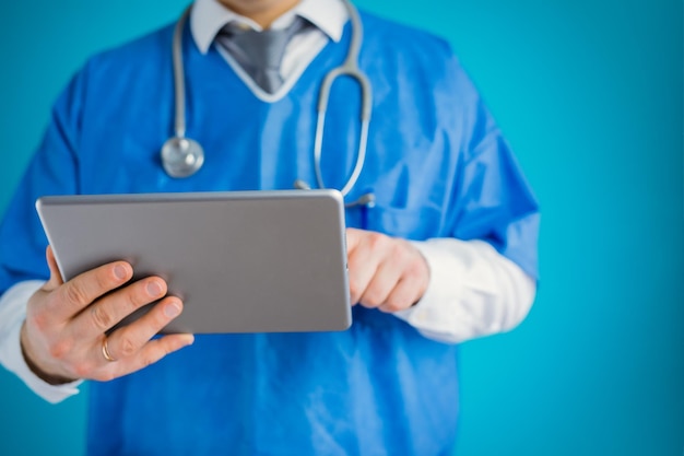 Closeup of doctor with tablet computer