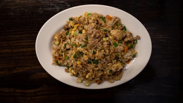 Closeup eating a popular taiwanese fried rice with pork egg and
vegetables taiwan traditional food