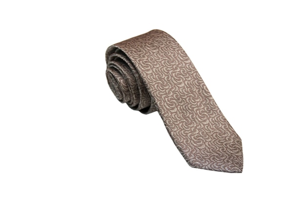 Closeup of an elegant stylish tie rolled and isolated on a white background