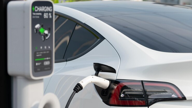 Photo closeup ev electric car recharge battery at parking lot in city commercial zone or mall alternative energy technology for rechargeable vehicle for sustainable and eco friendly travel expedient