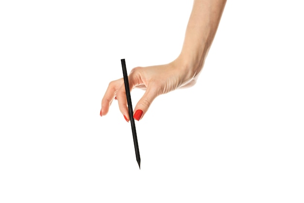 Closeup Female hand writing with a pencil black wooden pencil in hand isolated on white background with clipping path