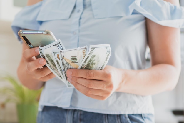 Closeup female hands counting money