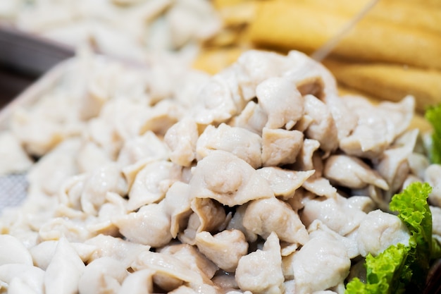 Closeup of fish dumplings, thai street food market