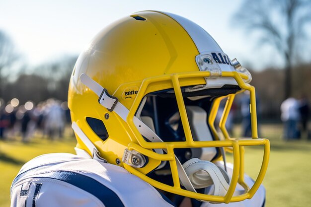 Closeup of a football helmet with a field in the back