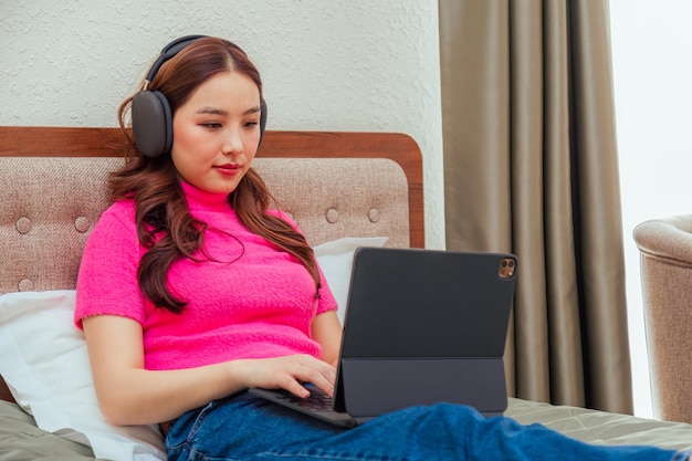 Closeup of freelance asian woman working at home