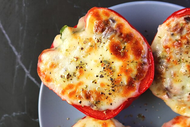 Photo closeup of fresh baked tasty and healthy homemade stuffed bell peppers