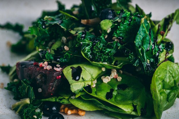 Closeup of fried greens served on a white plate