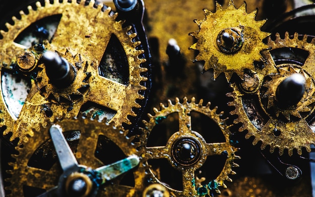 Photo closeup of gears and cogs clockwork