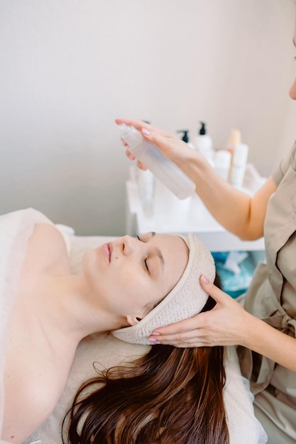 Photo closeup of a girl doing procedures at a beautician