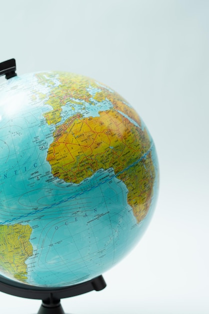 Closeup of a globe on white background