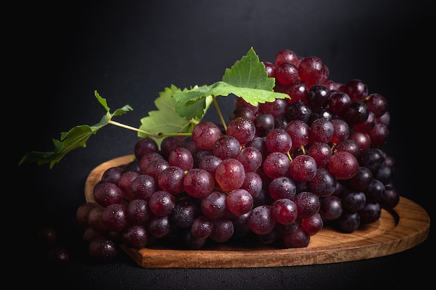 closeup of grapes on the table, dark tone.