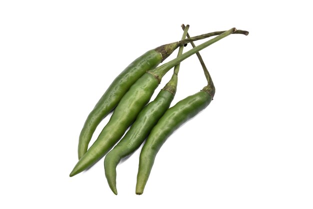 Closeup Green chilli pepper isolated on white backgrounda lot of chili before cookingspicy herbsFood ingredient photo macrohas path