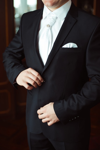 Closeup grooms wedding suit