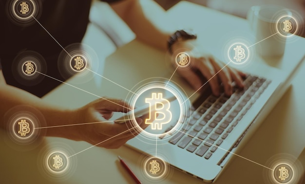 Closeup hand holding smartphone buy or sell virtual currency Bitcoin xAElectronic money blockchain transfers and finance concept
