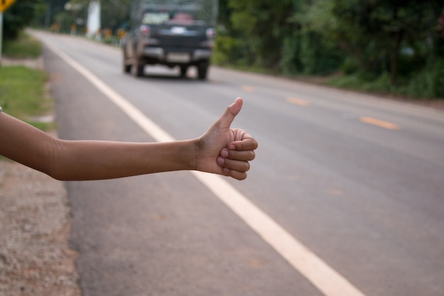 Closeup of Hand sign call a car