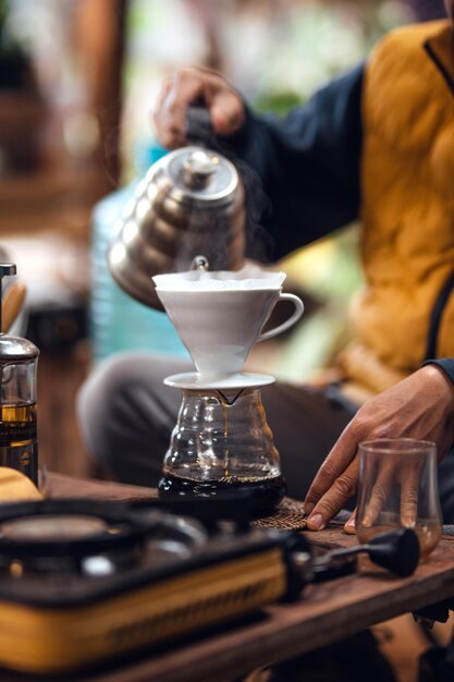 Closeup of hands barista make coffeedrip coffee