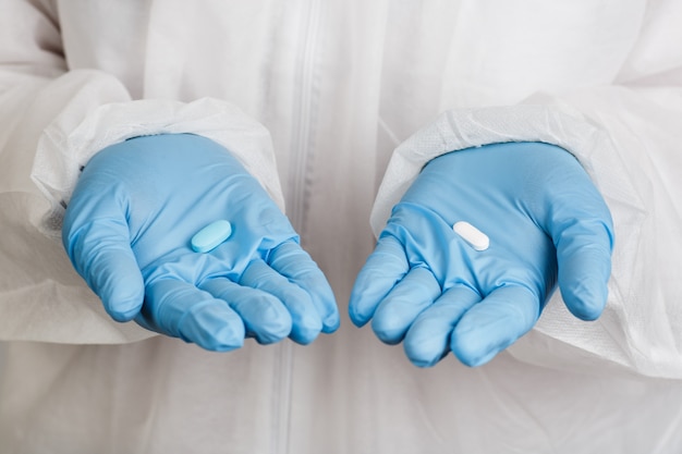 Closeup of hands in gloves with tablet