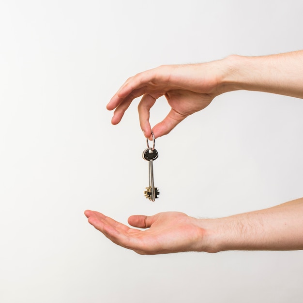 closeup hands holding keys