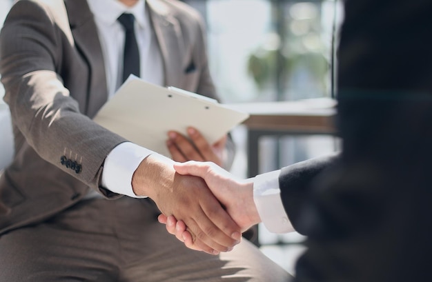 Closeup of handshake of business partners