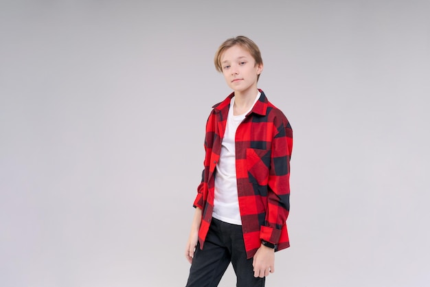 Closeup headshot of confident serious concentrated young man looking at camera studio portrait isola...