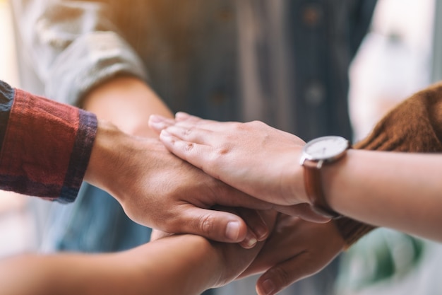 Closeup image of businessman putting their hands together in the meeting