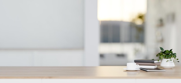 A closeup image of a wooden tabletop for display products in a minimalist white room