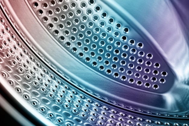 Closeup of inside of a steel washing machine drum