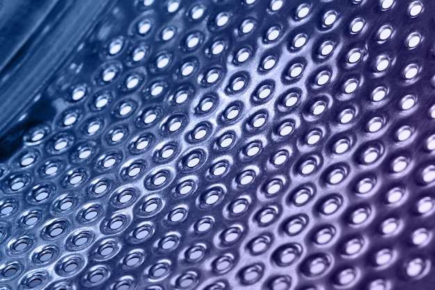 Closeup of inside of a steel washing machine drum