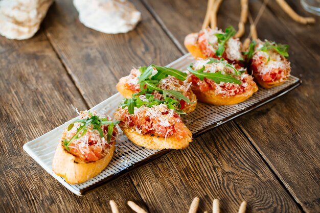 Closeup on italian appetizer bruschettas