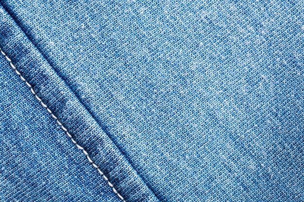 A closeup of jeans fabric with seam