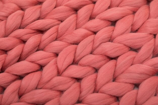 Closeup knitted coral wool from natural wool