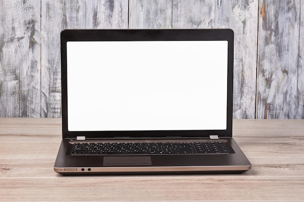 Closeup laptop pc with blank white screen