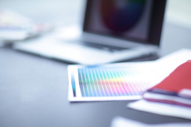 Closeup of a laptop on the table of the designer