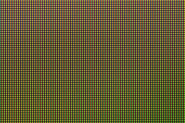 Foto diodo led del primo piano dal pannello di visualizzazione dello schermo del monitor del computer a led per il design.