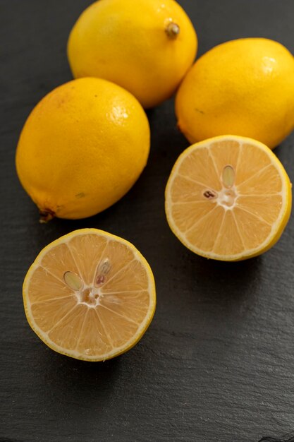 Photo closeup lemons on a white background