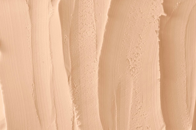 Photo closeup light brown creamy texture background